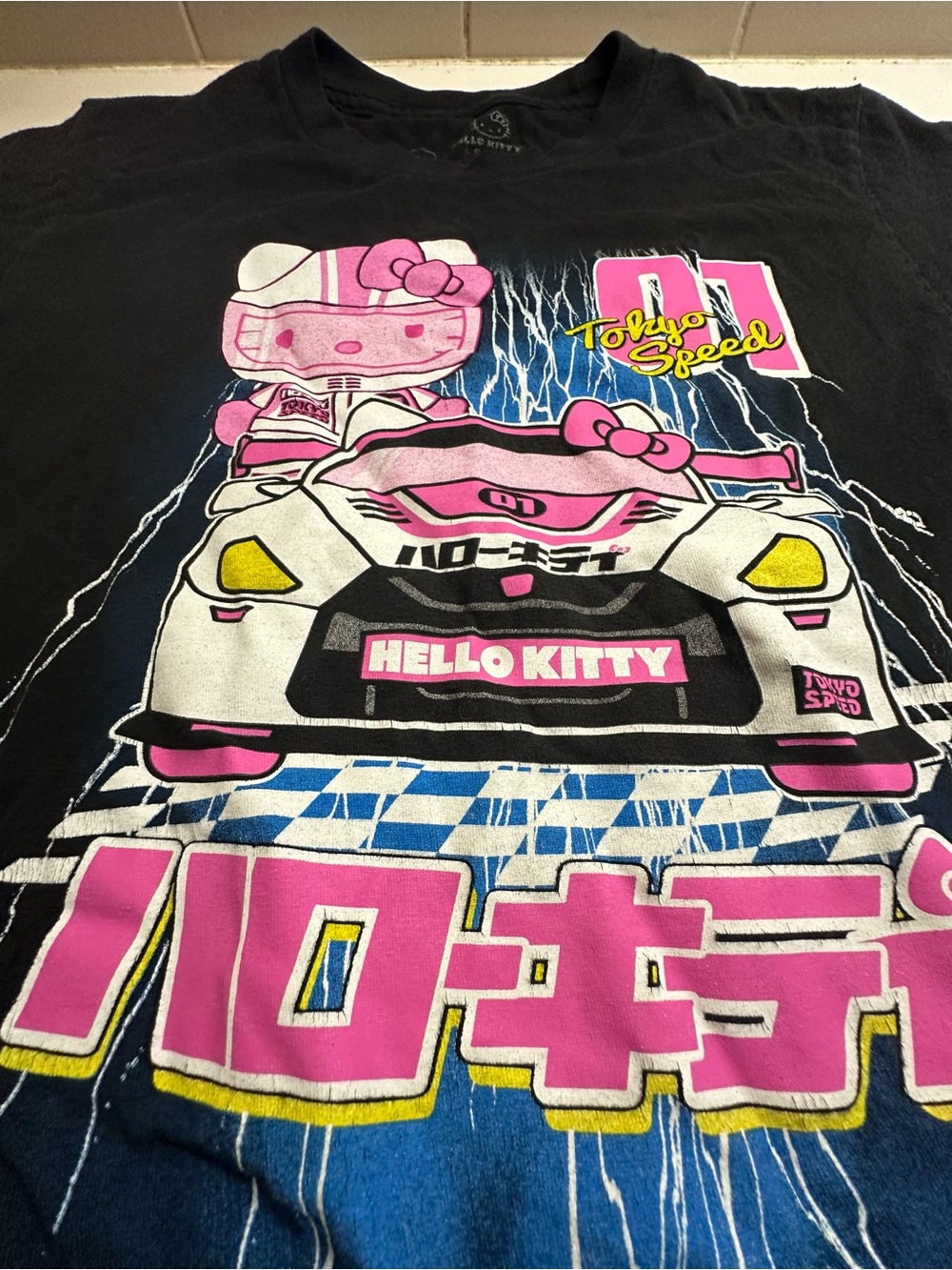 Hello Kitty Black Tee with Pink, White & Blue Racing Graphic